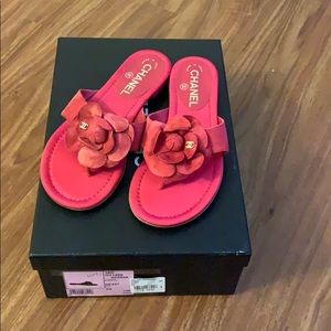Pink suede thongs sandals.